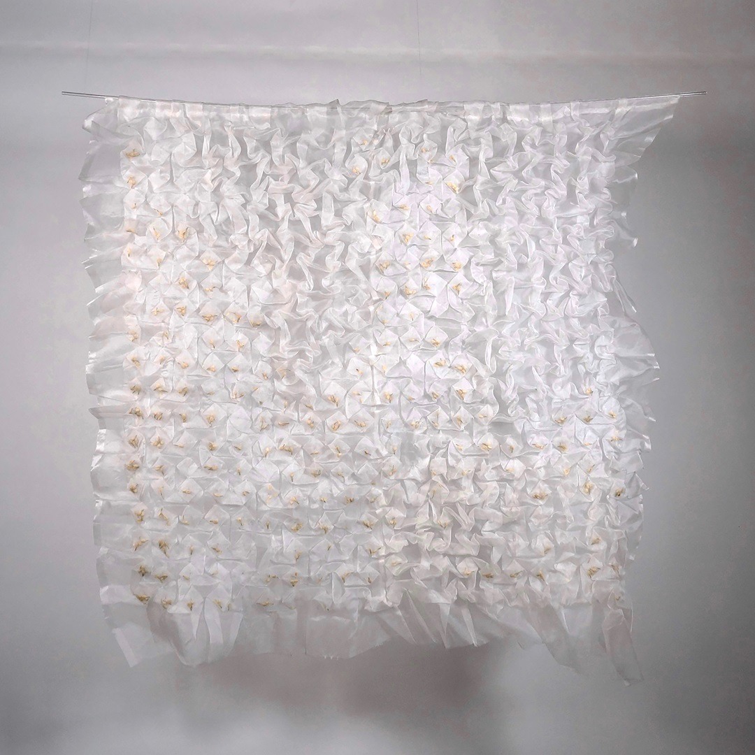 Pallavi Padukone, Jasmine II, 2019. 104cm x 112cm (41" x 44"). Embroidery. Silk organza, jasmine buds. Photo credit: Olivia Koval.