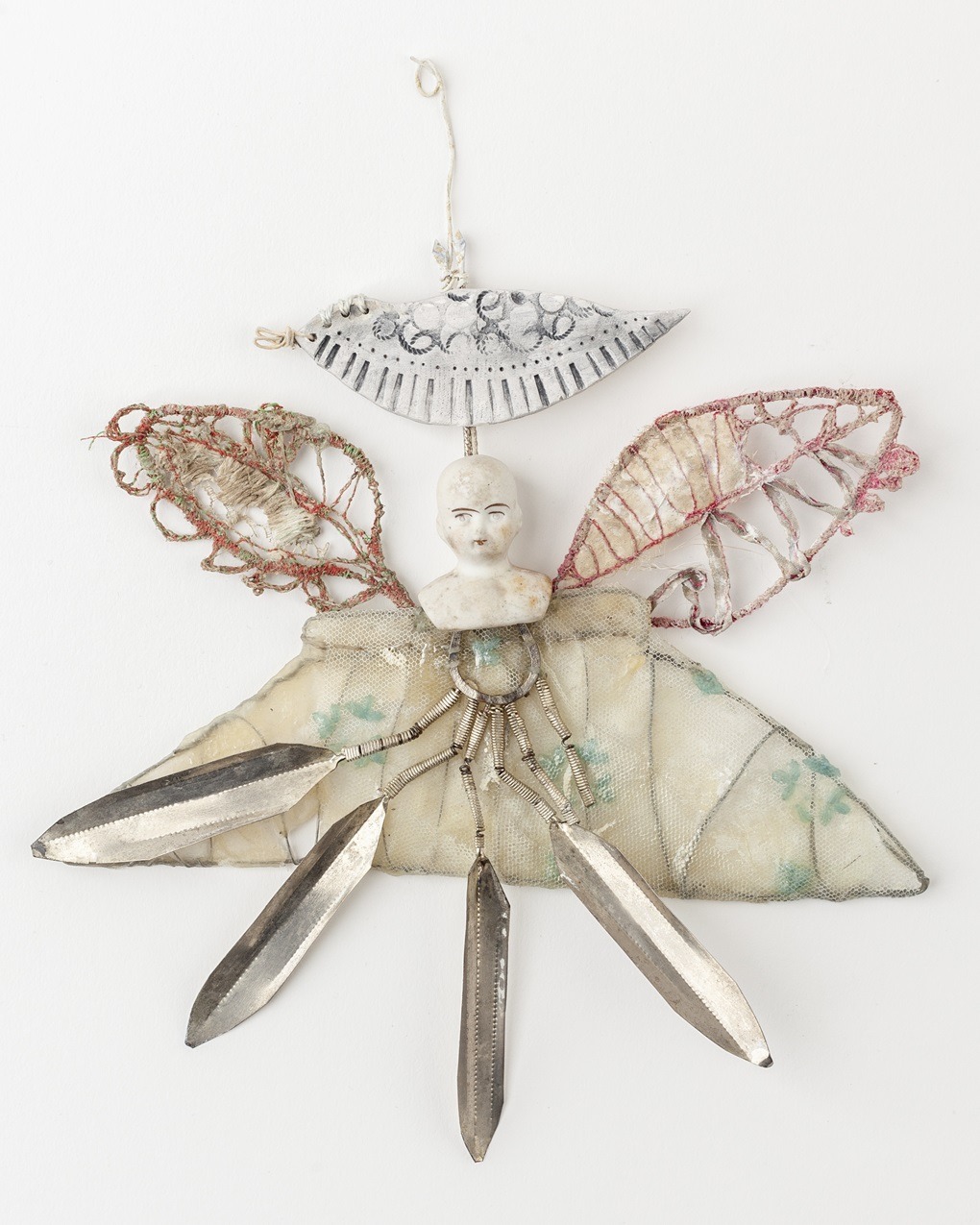 Priscilla Edwards, Angel, 2012. 14cm x 16cm (5½" x 6½"). Hand stitch, hand manipulated wire. Wire, silk, wax, rayon thread, paint, lace, porcelain, found materials. Photo: Mark Davis.