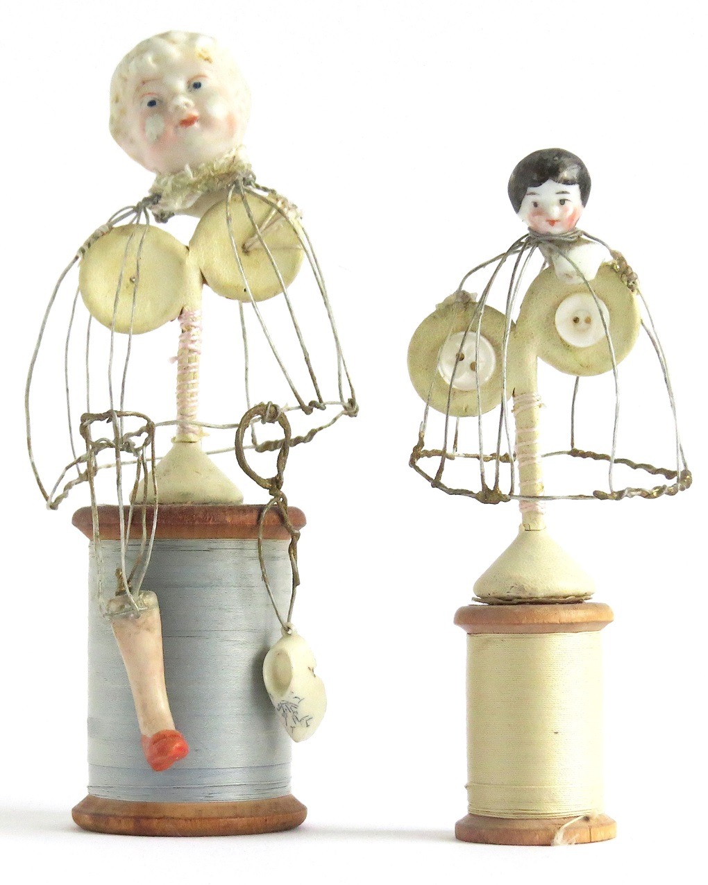 Priscilla Edwards, Mabel & Lucy, 2012. 14cm x 8cm (5½" x 3½") and 12cm x 7cm (4½" x 2¾"). Hand manipulated wire and hand stitch. Wire, found materials, cotton reels, rayon thread.