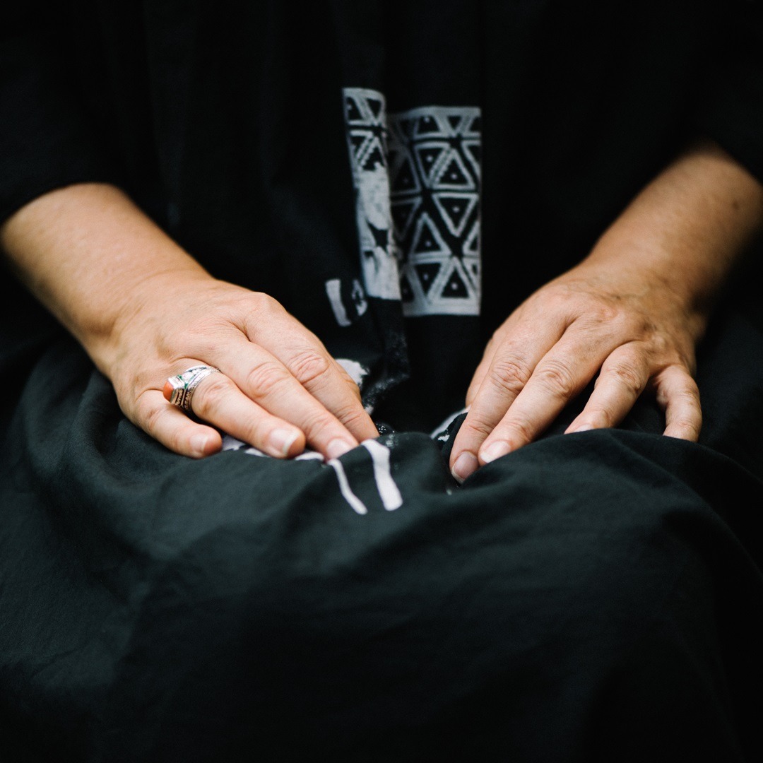 Kate Whitehead, Kate’s Dress (detail) – Honesty is the Best Policy Series (collaboration with Trouble at the Mill), 2019. Size UK 12, US 8.  Handmade dress, honesty plant print, discharge paste. Discharge paste on black fabric. Photo: Sarah Mason Photography.