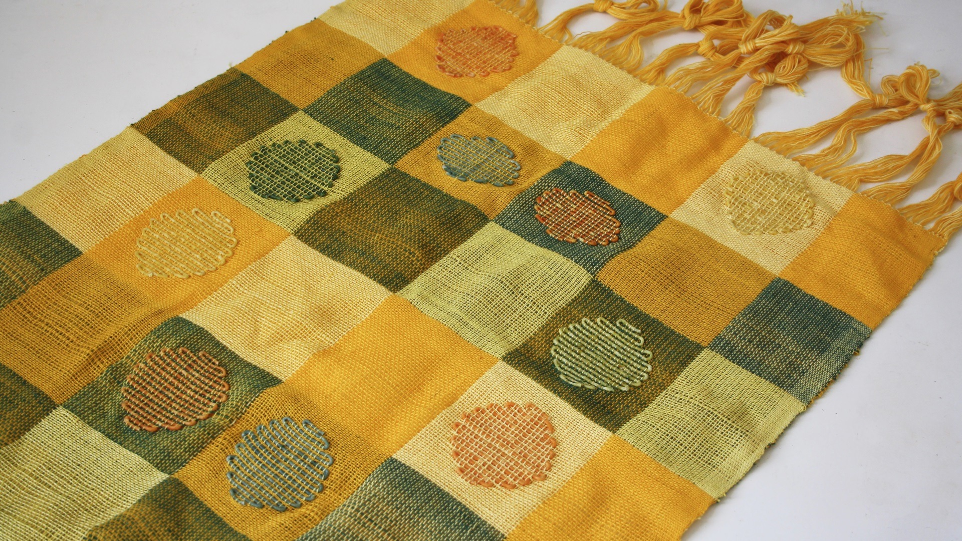 Pallavi Padukone, Citronella I, 2020. 39cm x 99cm (15.5" x 39"). Hand weaving. Pre-dyed cotton and citronella scented yarn dyed with turmeric, indigo and chilli.