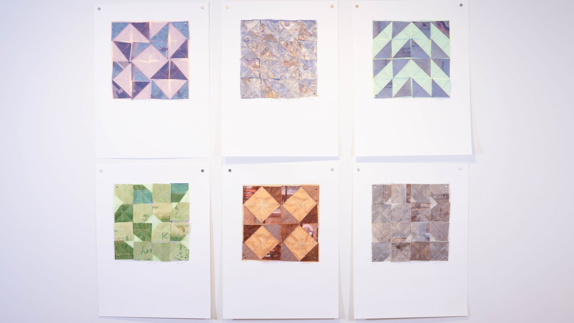 Amanda Britton, Beach Film Quilt series, 2023. 45cm x 61cm x 13cm (18" x 24" x 5"). Machine stitch. Organza, photo paper, cotton thread, silver brads.
