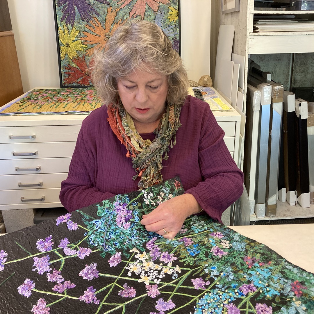 Mary Beth Schwartzenberger at work in her studio.