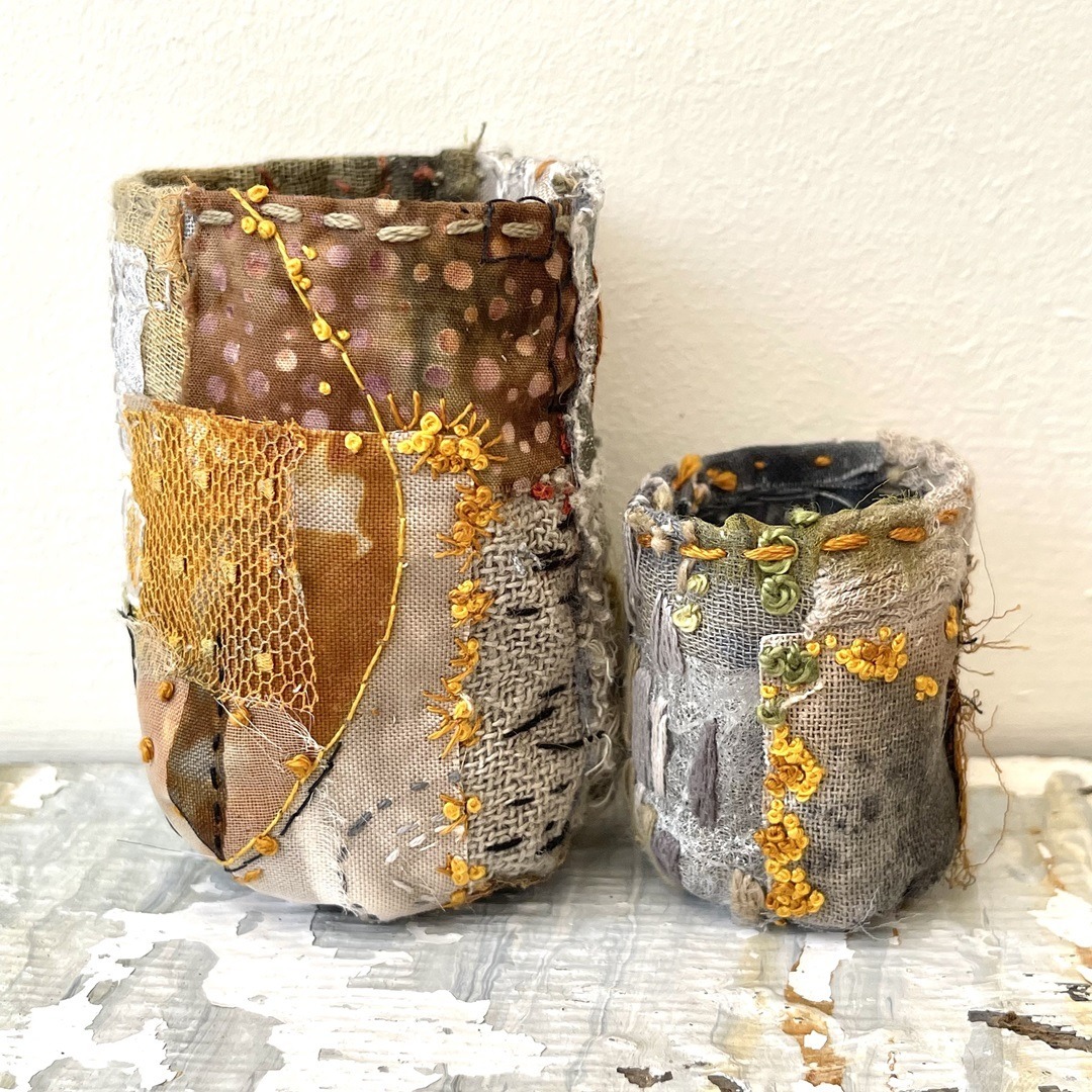 Rachael Singleton, Lichen on Stone, 2023. 5cm to 8cm high (2" to 4" high). Hand stitch. Calico, natural and vintage fabrics.