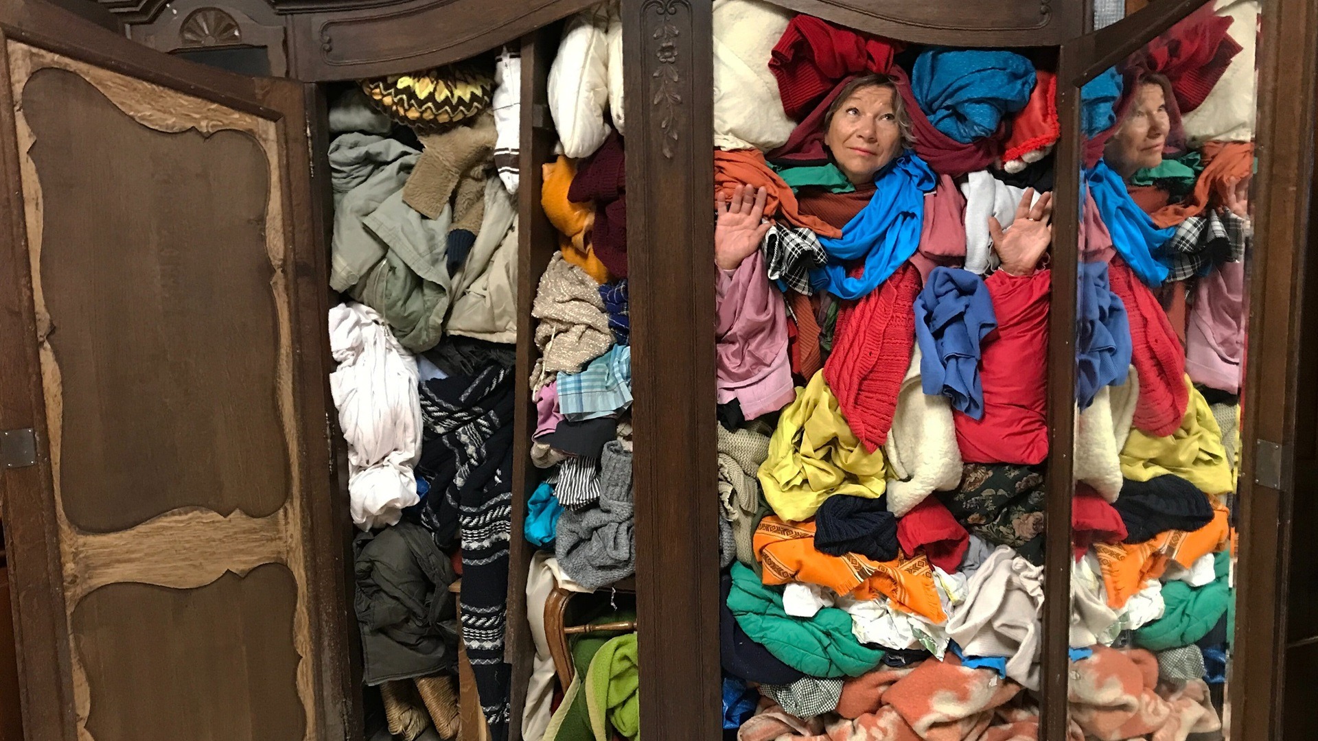 Ewa Cieniak, Wardrobe Altar, 2022. Installation with Maria. Wardrobe, clothing.