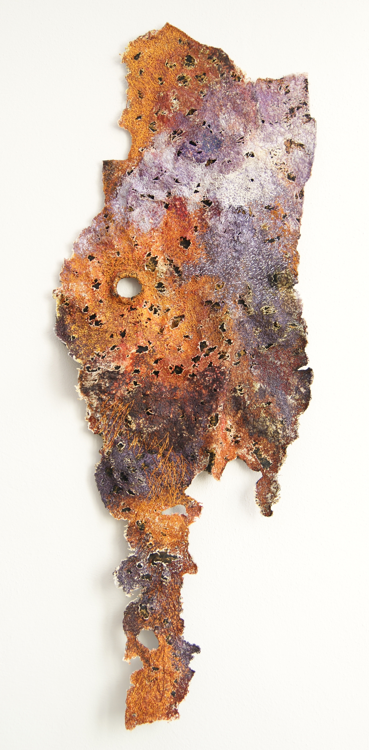 Sue Hotchkis dyes and prints on fabrics to create a layers before manipulating the fabric with hand stitch and machine embroidery