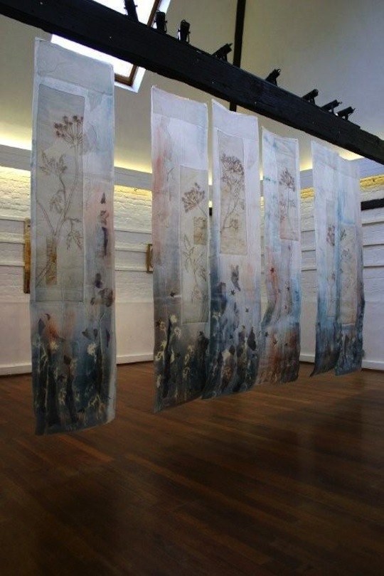 An example of textile art hung in a gallery