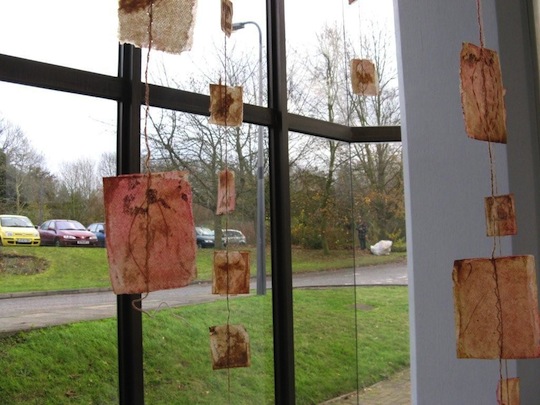 Hanging textile art can be tricky - her is how Cas Holmes did it at a recent exhibition