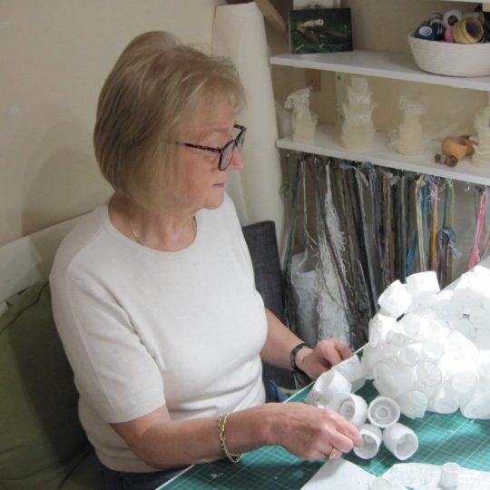 Marian Jazmik in her workroom.