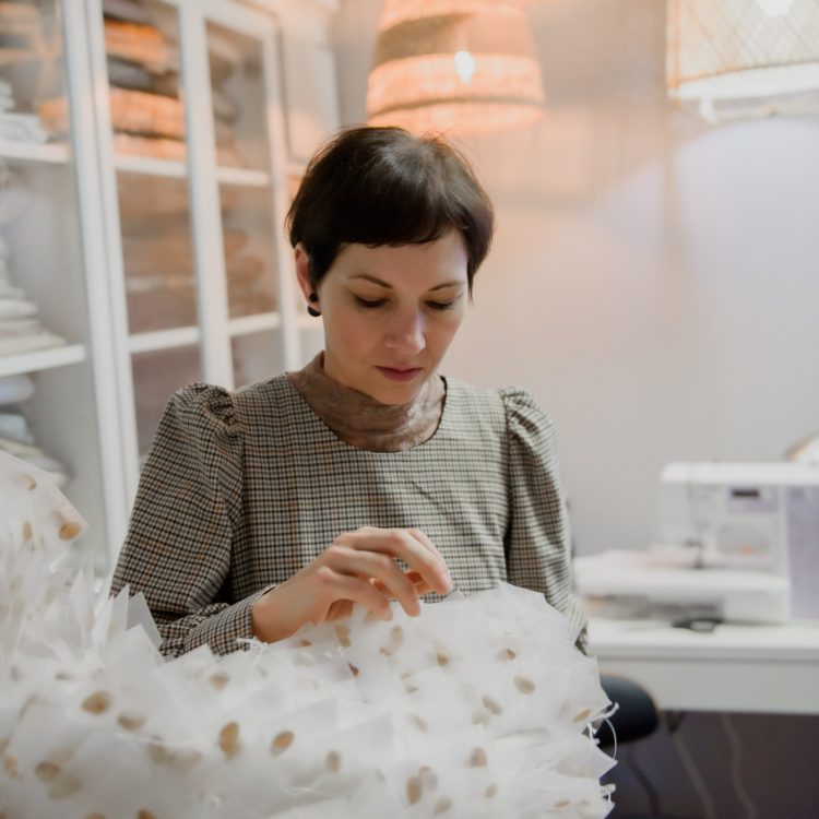 Tina Marais stitching her work Unfold, My Skin. Photo: Myriam Frenette