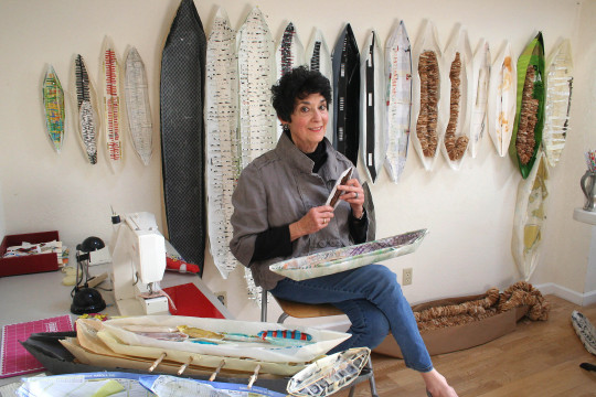 Paper textile artist Daniella Woolf in her studio