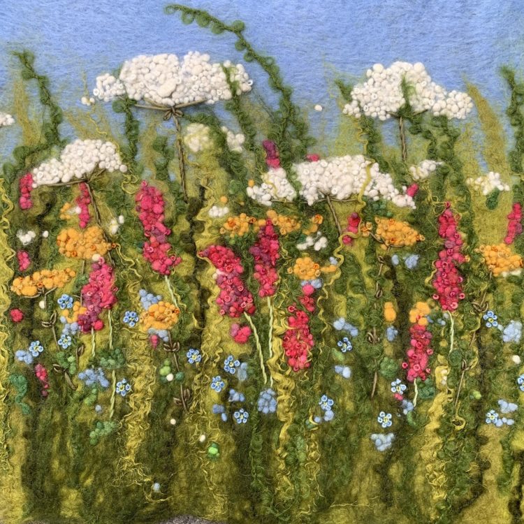 Lynn Comley, Summer Meadow (detail), 2022. 27cm x 27cm (11" x 11"). Wet felted wool and silk, embellished with hand stitching. Wool tops, silk tops, hand dyed artisan wool yarn.