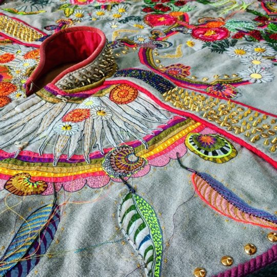 Louise Gardiner, The Cape of Empowerment, 2018. 175cm x 200cm (69" x 79"). Free machine embroidery, appliqué, hand painting, beading. Linen, silk, mixed textiles, textile paint, embroidery thread, beading and studs. Photo: Emma Williams and Lou Gardiner.