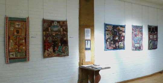 Wall of ‘Apron series’ pieces, Trinity Town and Country Gallery, Tunbridge Wells