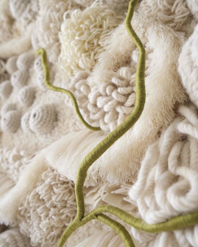 Vanessa Barragao, Afterlife I (detail), 2023. 140cm x 30cm x 230 cm (55" x 12" x 91"). Latch hook, crochet, fibre manipulation. Wool, tencel, jute backing, brass signature badge, repurposed fibres from textile factories.