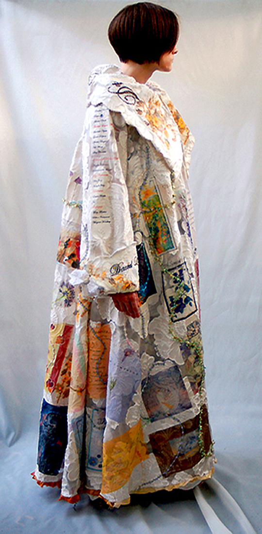 The Great Coat - Jacqueline Treloar, 2011, The Great Coat and the White Cat, Artscape Triangle Gallery Toronto - fully lined coat of cut nylon fabric with heat transfer images, beading and trims.