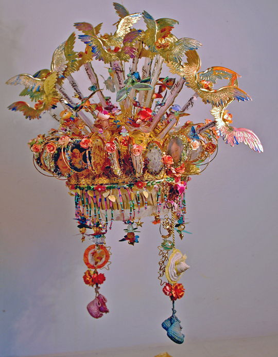 Corona Puer - Jacqueline Treloar, 2013, Coronae Reginae Caeli 1. The Gladstone Hotel Art Bar. Toronto 16” diam. fabric covered suspended crown with ttrims, beads and assorted artificial birds, flowers and butterflies.