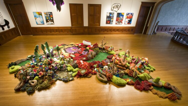 Leisa Rich, Beauty From The Beast, 2009. 7.5m x 6m (25' x 20'). Machine stitch, hand stitch, embroidery, trapunto, quilting, dyeing, hand painting, rolling, smocking, construction. Wool, fabrics, vinyl, thread, recycled elements (plastic straws, plant stakes, packing materials, strapping tape, bubble wrap, carpet samples, quilts, cut up art pieces). Photo: Michael West.