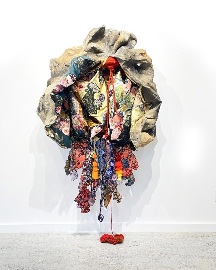 Leisa Rich, Death Pod Rising, 2023. 203cm x 117cm x 51cm (80" x 46" x 20"). Heat manipulation, free motion embroidery, crochet, 3D printing, sewing, embroidery, trapunto, collage, quilting, painting, dyeing. Fosshape mouldable fabric, new and repurposed fabrics, yarn, thread, vinyl, dyes, PLA bioplastic, acrylic. 