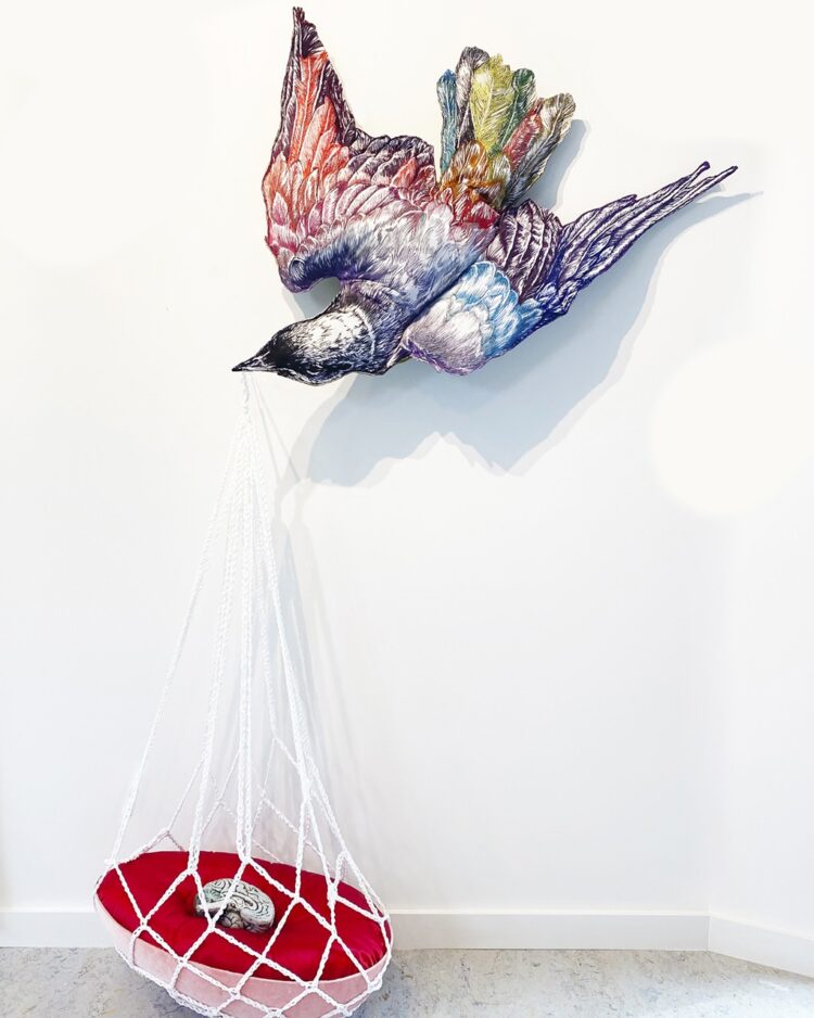Leisa Rich, Endangered Cargo, 2023. 203cm x 127cm x 51cm (80" x 50" x 20"). Free motion embroidery, crochet, sewing, construction. Reclaimed textiles, fabrics, found objects, thread.