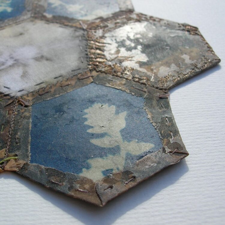 Hannah Lamb, Fragments Patched 2 (detail), 2013. 16cm x 16cm (6" x 6"). Cyanotype, natural dye and patchwork. Textile, paper and beeswax.