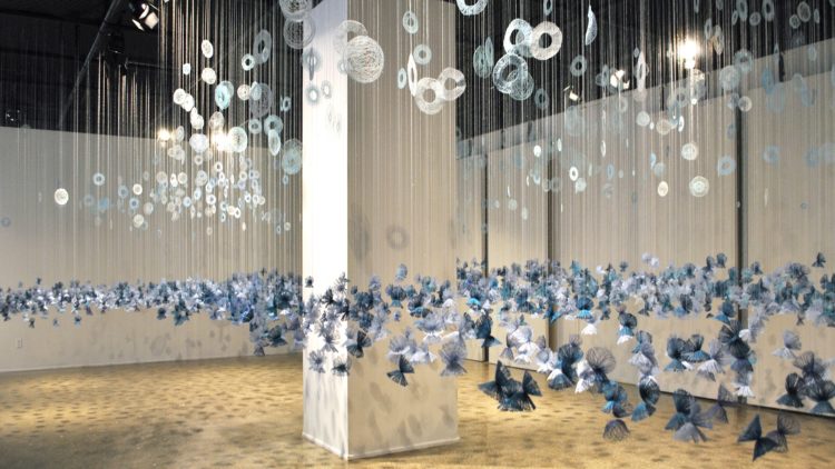 Amanda McCavour, Far Away Blue Fields, 2022. 6m x 8m x 3m (20’ x 25’ x 10’). Embroidery on water-soluble fabric. Thread.