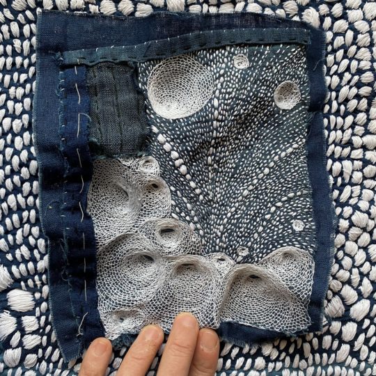 Lindsey Gradolph, We Don’t Need Roads, 2021. 16xm x 20cm (6” x 8”). Antique indigo dyed cotton, white cotton thread. Hand embroidery.