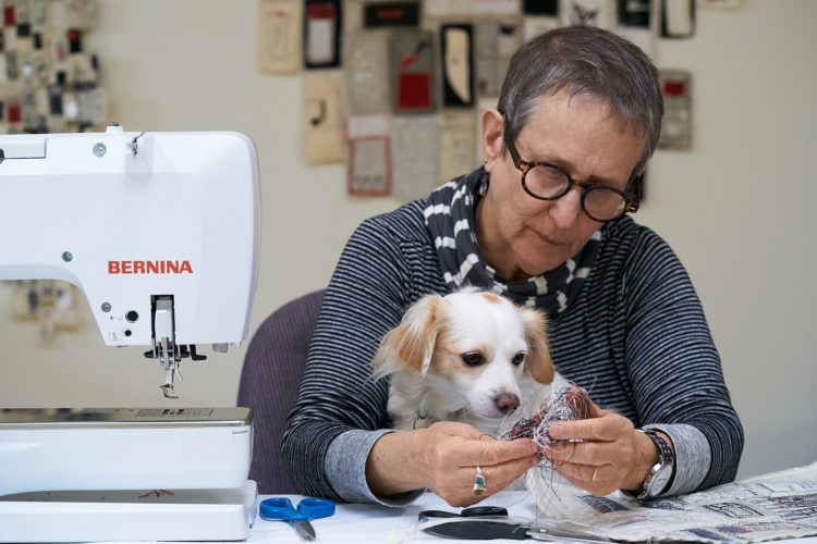 Lisa Kokin in her studio with her assistant, Austin, 2021. Photography: Lia Roozendaal