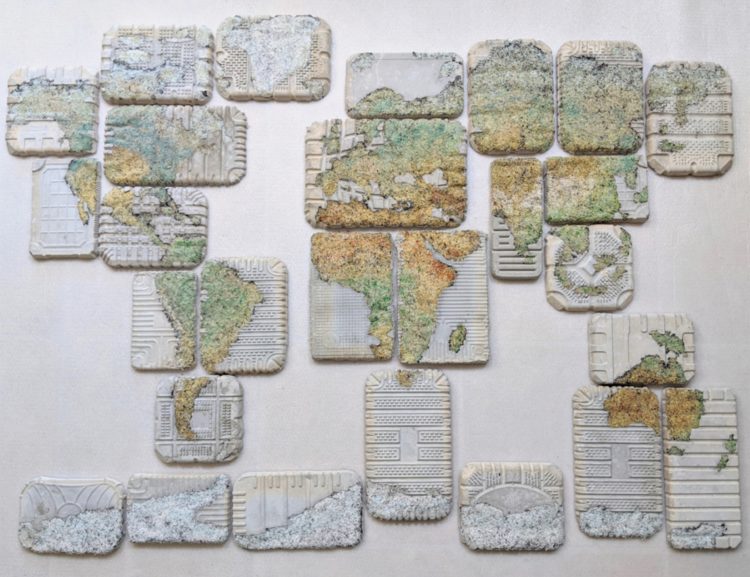 Nerissa Cargill Thompson, No Man is an Island: Mapping the Issue, 2020. 120cm x 90cm x 4cm (47" x 35½" x 1½"). Embellished recycled materials, concrete, household plastic waste. Embellishing, casting.
