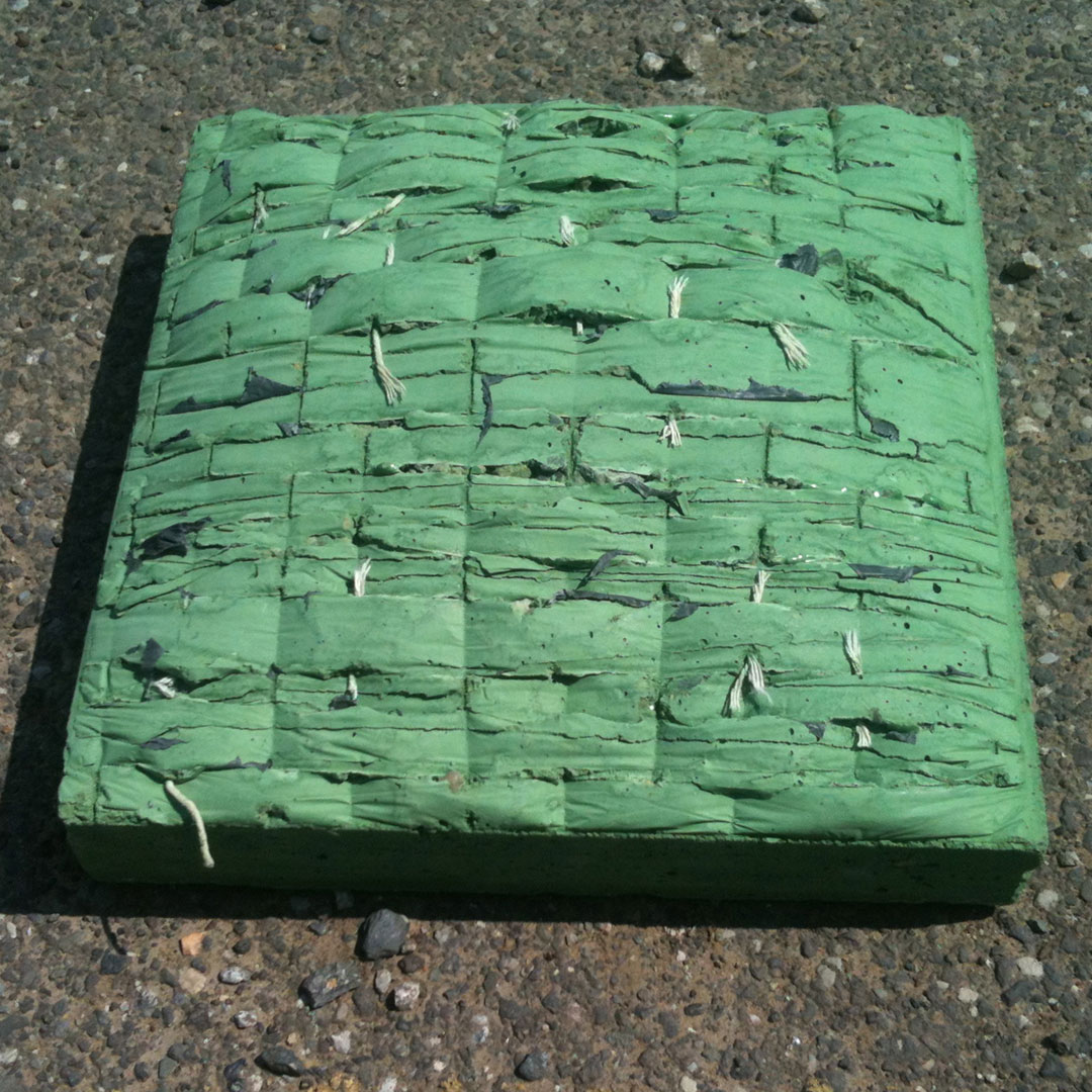 Concrete moulded on woven surface