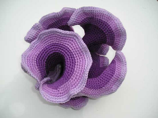 Purple crochet textile art by Daina Taimina