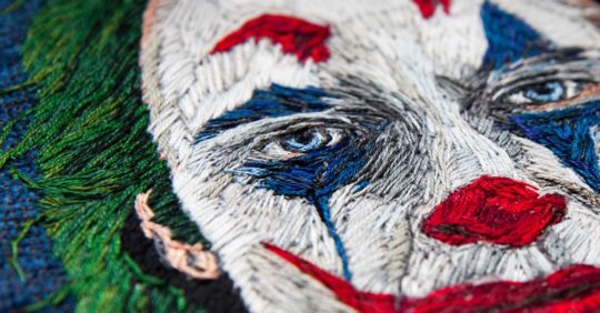 Jane C Thom, Joker (detail), 2020. 25cm x 20cm (10" x 8"). Long and short stitch. Upholstery fabric sample, DMC and Anchor embroidery threads. Photo: @daniellelucy.