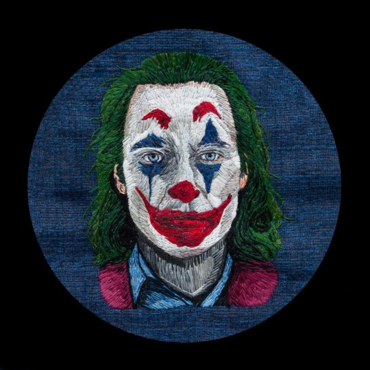 Jane C Thom, Joker, 2020. 25cm x 20cm (10" x 8"). Long and short stitch. Upholstery fabric sample, DMC and Anchor embroidery threads. Photo: @daniellelucy.