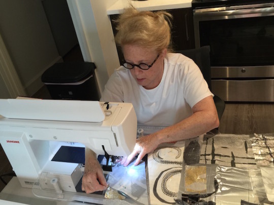 Mary Fisher at work in her studio 