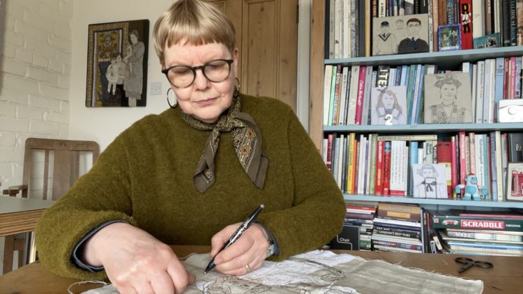 Sue Stone working in her studio.