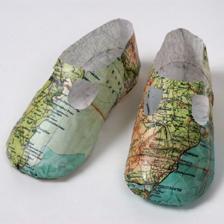 Jennifer Collier, Map Baby Shoes, 2007. 18cm x 18cm x 8cm (7" x 7" x 3"). Maps and moulding medium. Photo: Luke Unsworth