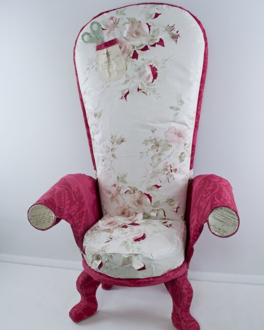 Jennifer Collier, Sewing Chair, 2014. 50cm x 50cm x 125cm (19½" x 19½" x 49¼") Reverse appliqué, machine stitch, covered buttons and paper pocket. Wallpaper and machine stitch (found paper and grey board for scissors).