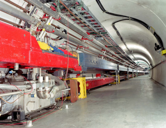 Magnets in Fermilab’s underground tunnel by Reidar Hahn