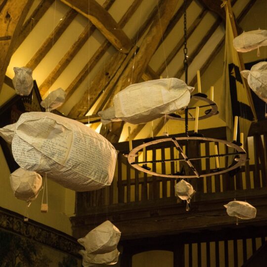 Jennifer Collier, First World War Observation Balloons created from copies of the donor families' war diaries, NT Packwood House, Solihull, 2018. The biggest balloon is 1m (39") long, the smallest 30cm (11¾"). Machine stitch and paper manipulation. Site specific papers and thread.