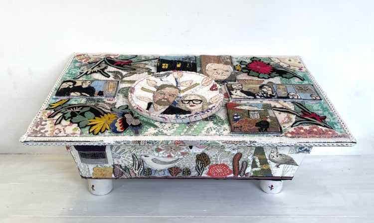 Anne Kelly, Zoom Family Casket, 2021. 55cm x 35cm x 25cm (21½" x 14" x 10"). Hand and machine stitch, mixed media, collage, appliqué.  Embroidered panels, canvas, papers, fabric embellishments, embroidery hoop, wooden casket.