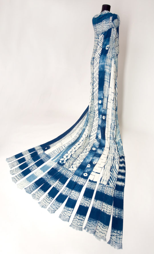 Bren Ahearn, Shibori Strip Weaving #2, 2005, 116x22H X 49x22W, Plain Weave Cloth with Various Resist Techniques, Rayon and Indigo and Polyester Thread, Photo by Charr Crail