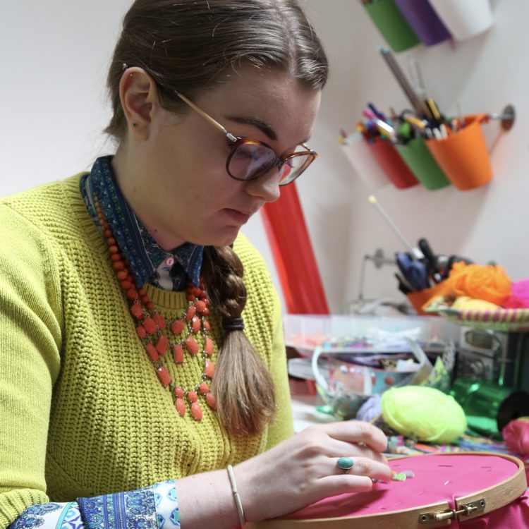 Jessica Grady stitching in her studio.