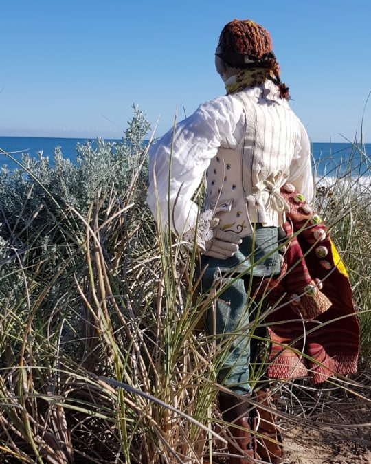 Susie Vickery, Peregrinations of a Citizen Botanist (The Botanist Looking out to Sea), 2019. 30cm x 75cm (12" x 29½"). Embroidery, puppet making. Fabric, thread, leather.