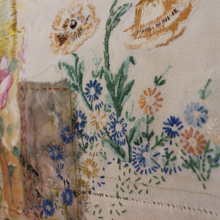 Cas Holmes, The Garden (detail), 2022. 77cm x 70cm (30" x 27½"). Painted and dyed vintage materials, collage, machine and hand stitch. Vintage cloth, dye, paint, thread, images transferred from a gardening magazine.
