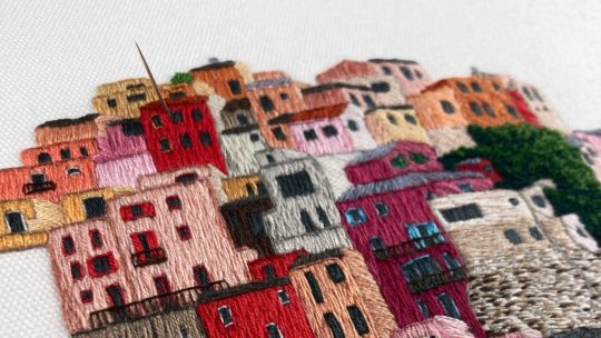 Charles-Henry and Elin Petronella, Manarola, Italy for Thread Painting Embroidery 2, 2022. 20cm diameter (8”). Satin stitch, split stitch, straight stitch, French knot, backstitch. Cotton fabric, DMC cotton mouliné.