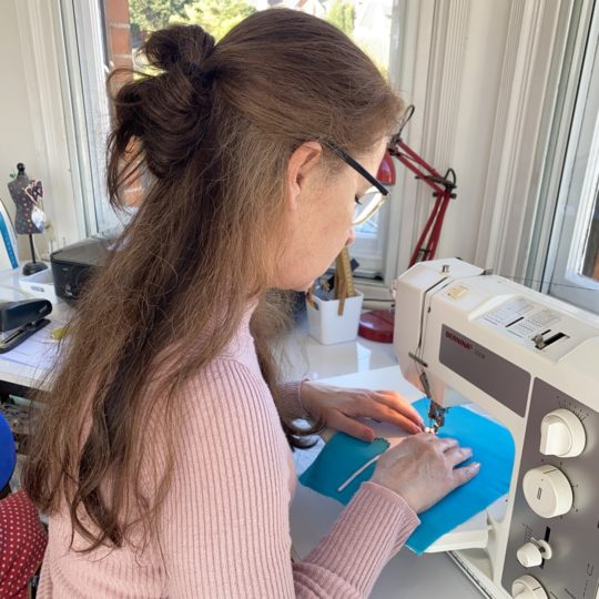 Gillian Bates working in her studio.