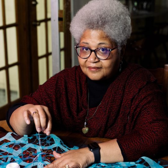 Valerie Goodwin stitching in her studio.