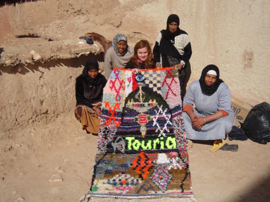 Terra Fuller with Boussain family and Touria Cave Carpet, hand woven carpet