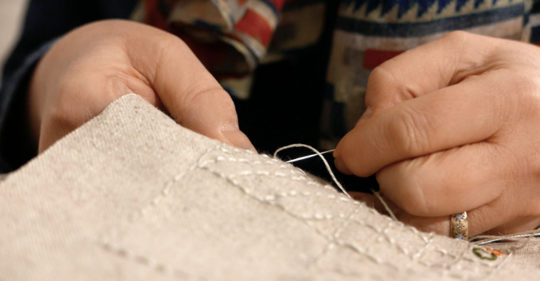 Textile artist Sue Stone at work