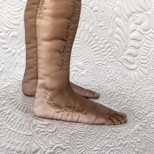 Neroli Henderson, The World Awaits (detail feet) #TimesUp, 2018, 90 x 90cm, giclée print. Photography (artist’s own) on silk, intensive stitch